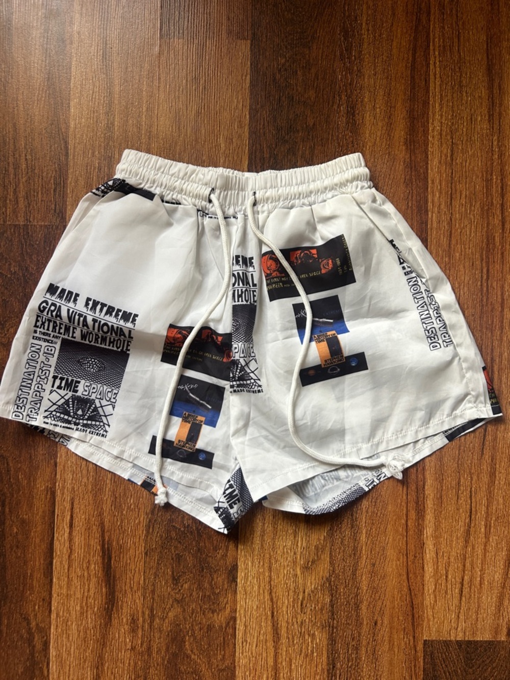 SHEIN White Graphic Athletic Drawstring Shorts with Black & Blue Accents